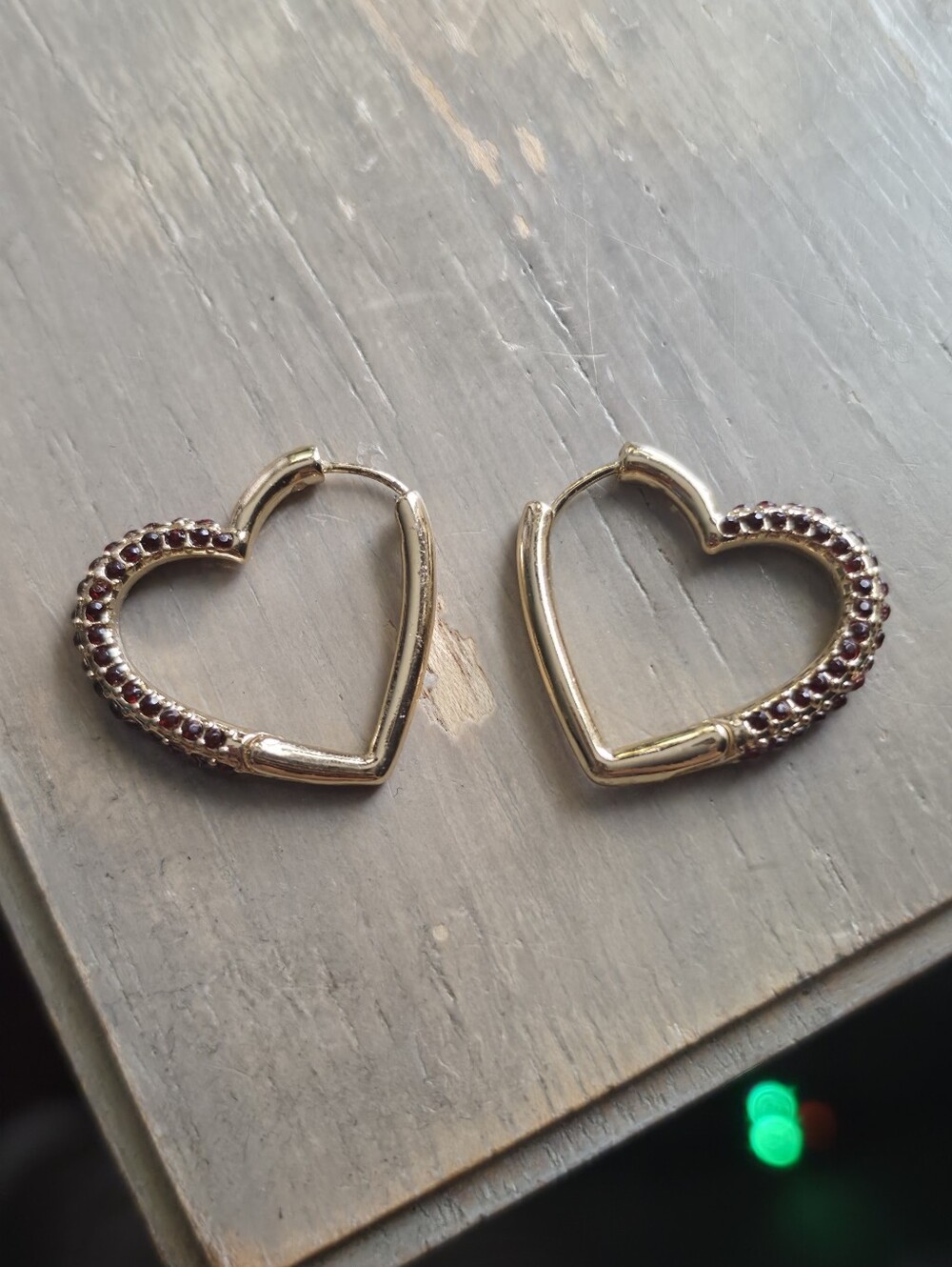 Gold Heart Hoop Earrings with Deep Red Gem Accents